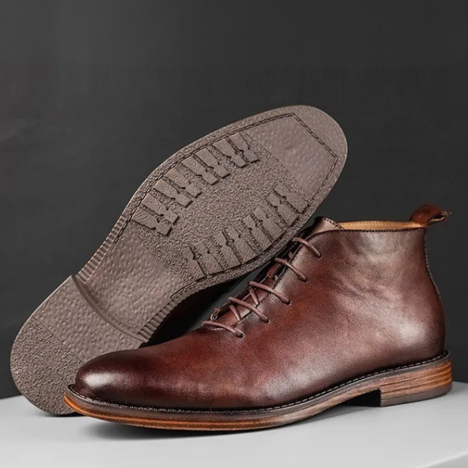 Durable men's premium leather boots, combining sophisticated dress style with lasting comfort.