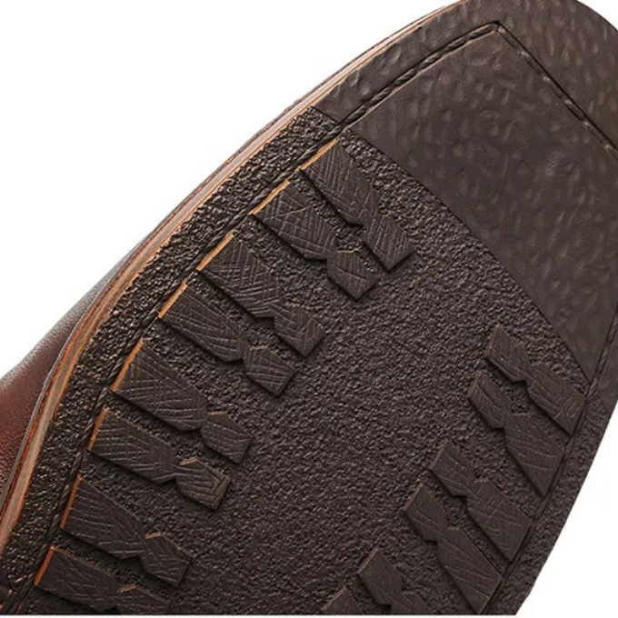 Front view of men's versatile brown leather comfort boots, perfect for any formal or casual occasion.