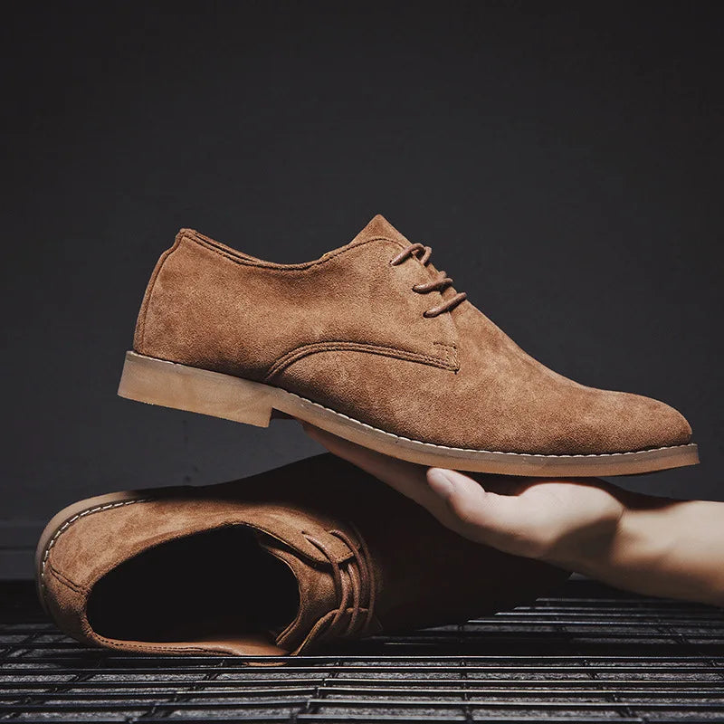 Angled view of men's classic brown suede Derby shoes, emphasizing their timeless design & quality.