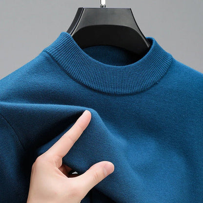 Mens premium cashmere crewneck sweater. Soft, long sleeve knitwear with an elegant hem, perfect for sophisticated style.