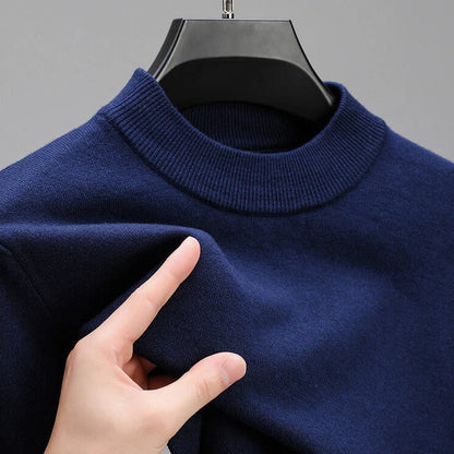 Sophisticated men's cashmere knit sweater. A premium, comfortable long sleeve wardrobe staple with an elegant hem.