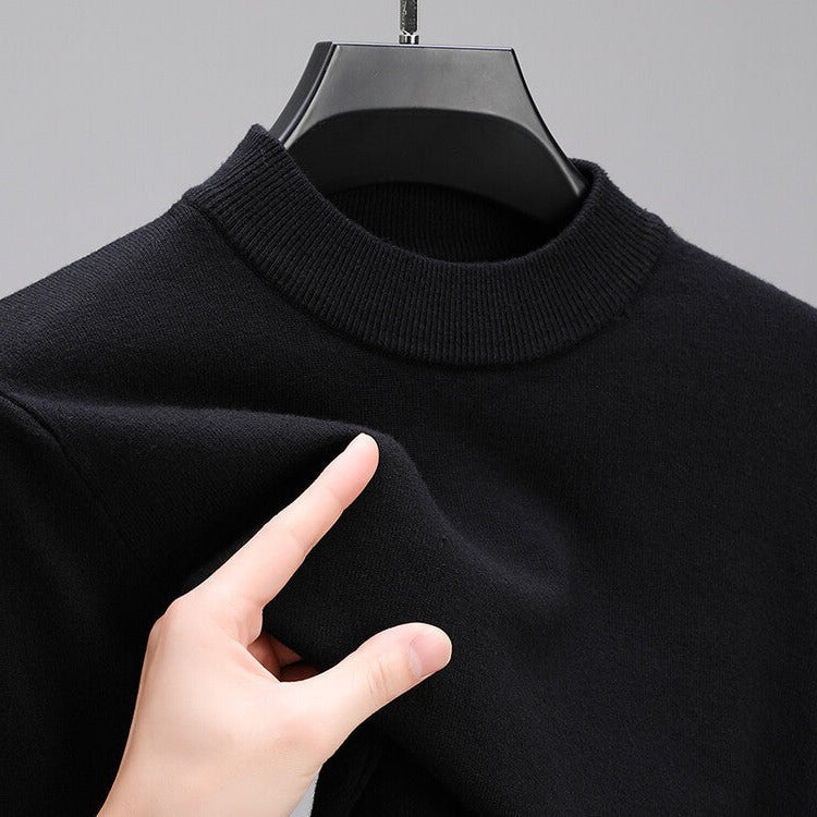 Men's premium cashmere long sleeve sweater, featuring an elegant hem. High-quality, comfortable & versatile knitwear.