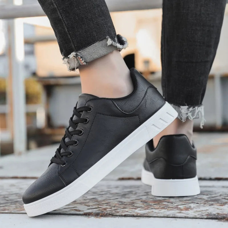 Top view of black men's versatile sneakers, premium comfort casual footwear for everyday wear.
