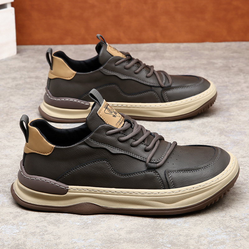 Close-up of material on men's cushioned walking sneakers, highlighting premium texture.