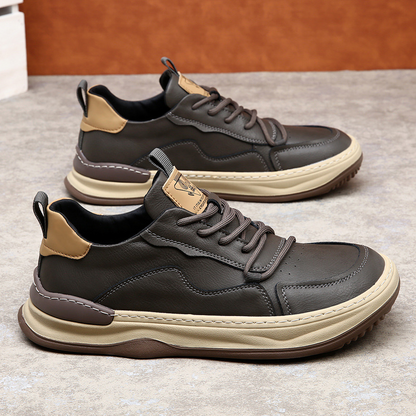 Close-up of material on men's cushioned walking sneakers, highlighting premium texture.