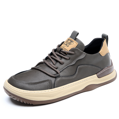 Close-up of durable outsole on men's walking sneakers, engineered for traction and support.
