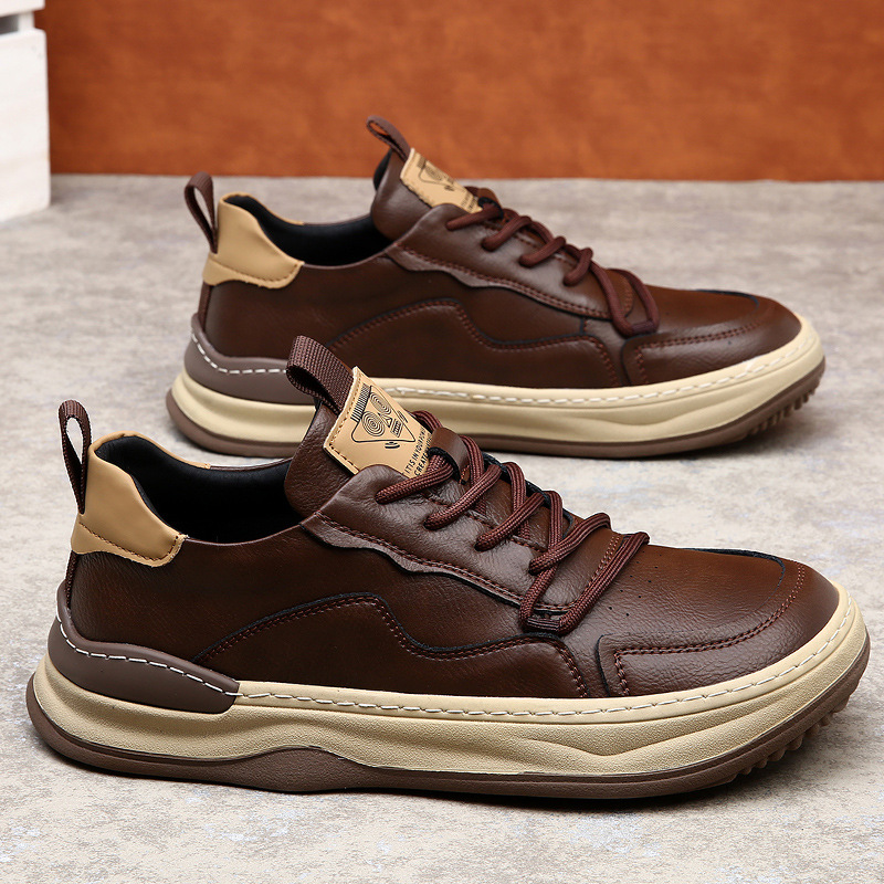 Comfortable gray men's sneakers, cushioned for walking, with durable outsole & padded ankle.