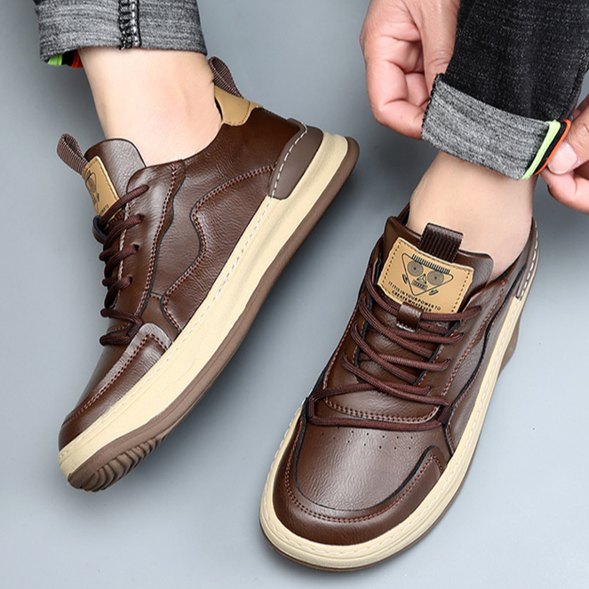 Side view of men's premium walking sneakers, showcasing cushioned design & durable construction.