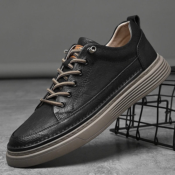 Black Genuine Leather Sneakers for Men. Premium black casual shoes with enduring style, perfect for everyday wear.