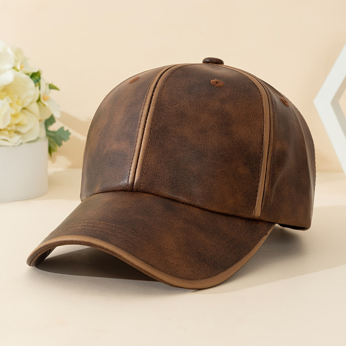 Brown men's leather hat, premium quality with a classic, stylish design.