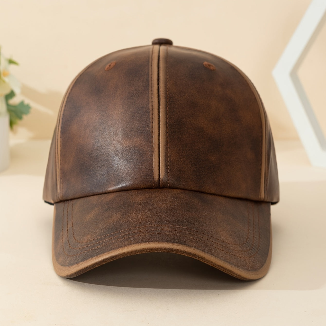 Black men's leather hat, a rugged and fashionable accessory for any modern look.