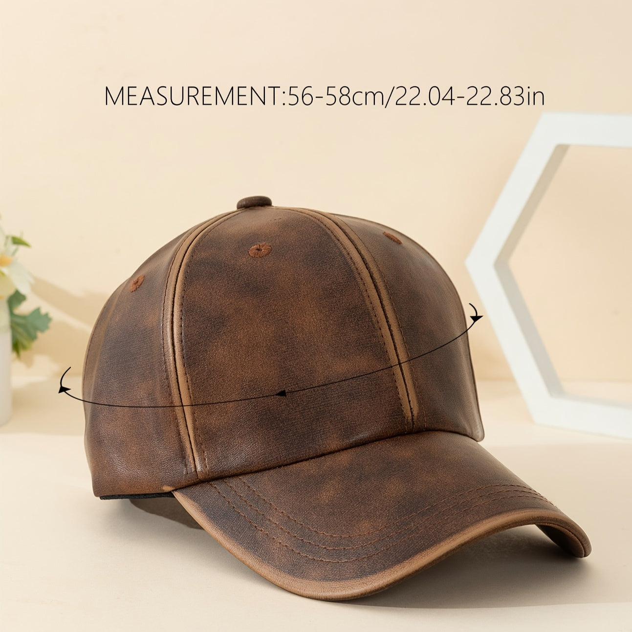 Close-up of a men's premium brown leather hat, showcasing its rich texture and classic design.