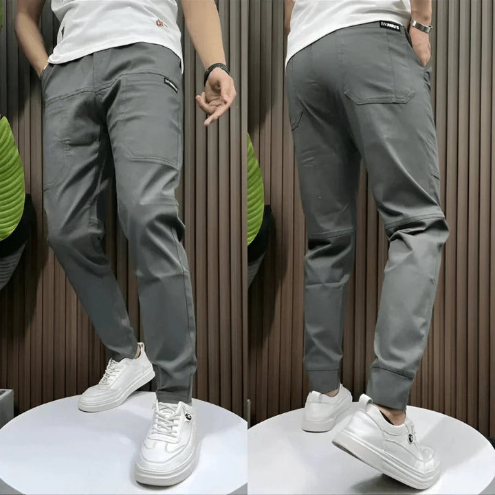Stylish men's slim fit cargo pants with functional pockets, ideal for a versatile everyday casual look.