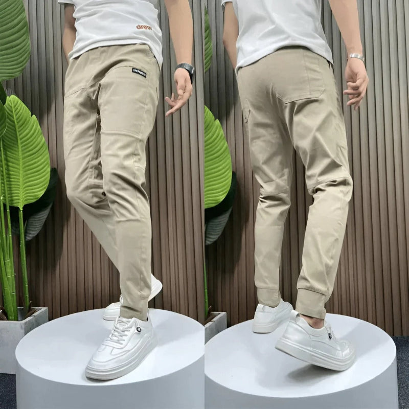 Modern men's slim fit cargo pants, offering comfort and a sleek silhouette for any casual or everyday occasion.