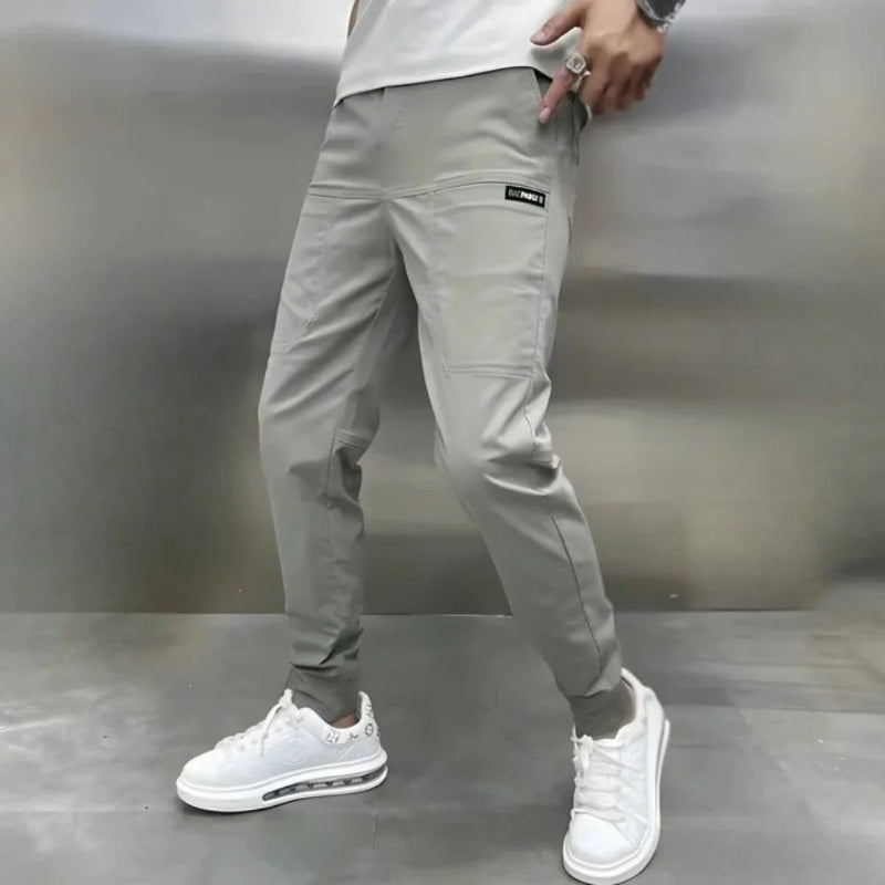 Premium tailored men's slim fit cargo pants, combining durability with a contemporary, stylish design.