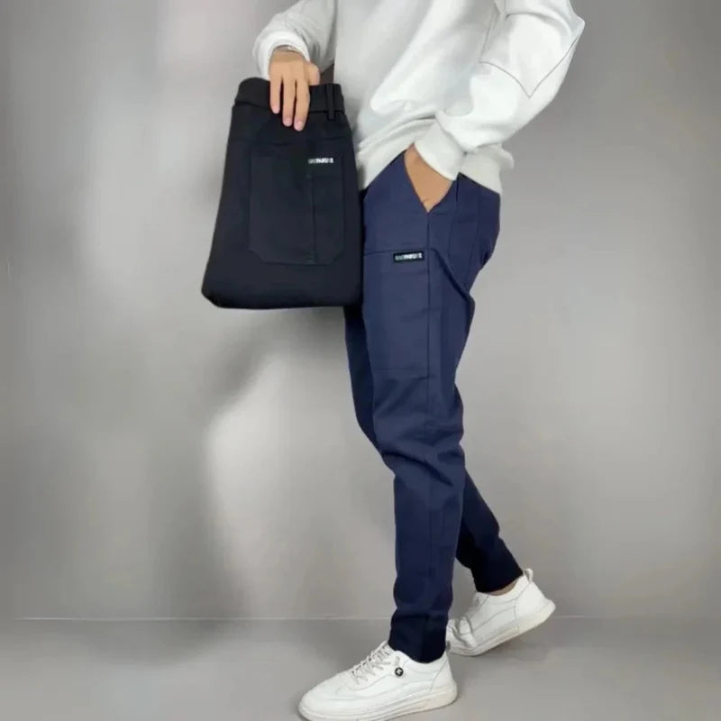 Versatile men's slim fit cargo pants, a perfect bottom for a modern, stylish, and comfortable everyday outfit.