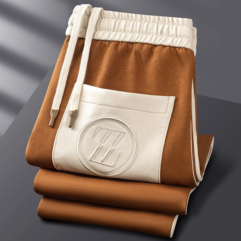 Close-up of premium fabric on men's tracksuit set. Durable, comfortable athletic wear for active lifestyles.