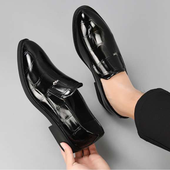 Side profile of stylish men's dress shoes, lightweight & comfortable professional loafers for business fashion.