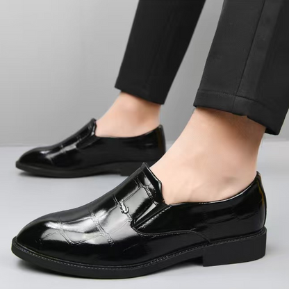 Front view of sharp mens business loafers, easy slip-on formal footwear for a polished, professional look.