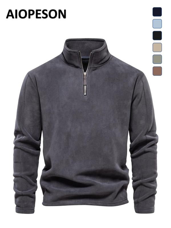 Stylish men's quarter zip fleece ideal for versatile layering, offering warmth and comfort.