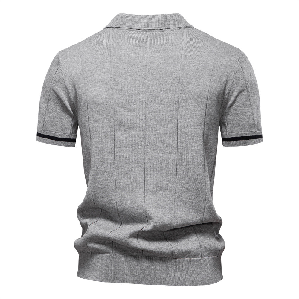 Men's quarter-zip polo with structured collar, offering a smart casual look & comfortable fit. Cotton blend.