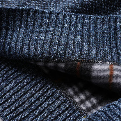 Back view of men's warm quarter-zip turtleneck sweater, highlighting rugged knit & comfortable design.