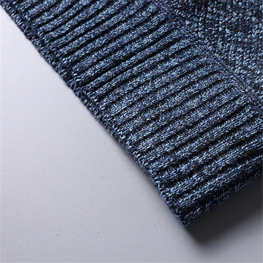Side profile of men's quarter-zip turtleneck sweater, showing slim fit & stylish design for winter.