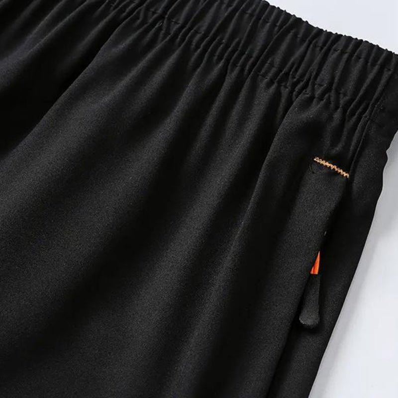 Back view of men's quick-dry athletic performance shorts, featuring comfortable waistband for running & workouts.
