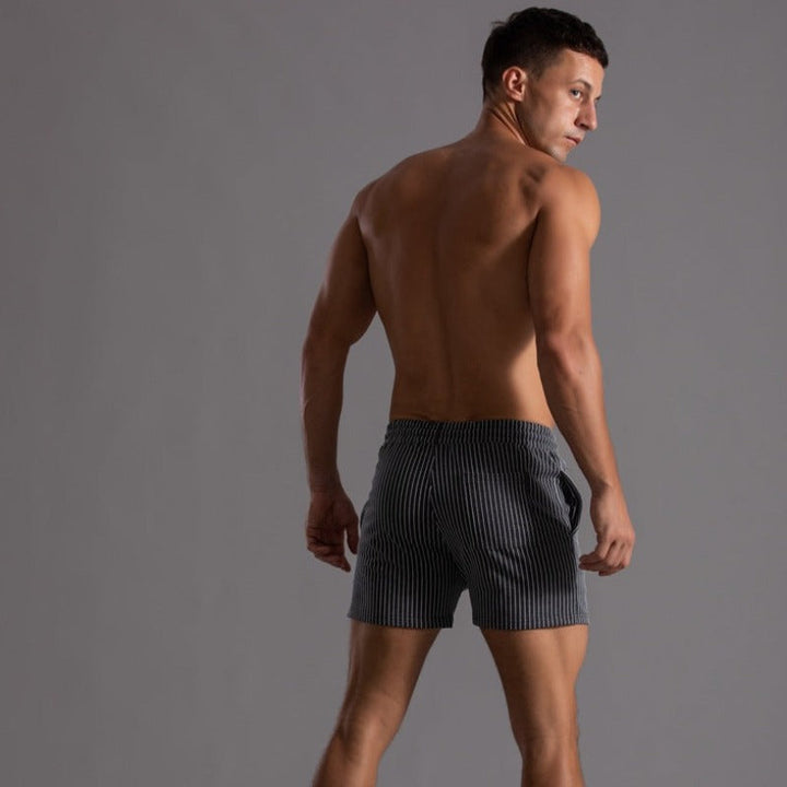 Men's versatile quick-drying swim shorts, Ripstop-Polyester for active wear.