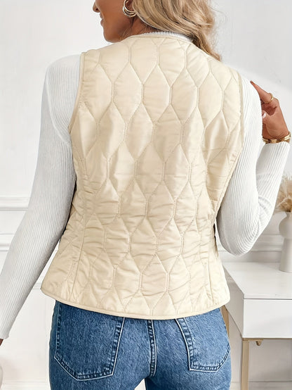 Front view of a versatile men's bomber vest. Features a diamond quilt pattern & warm sherpa lining.