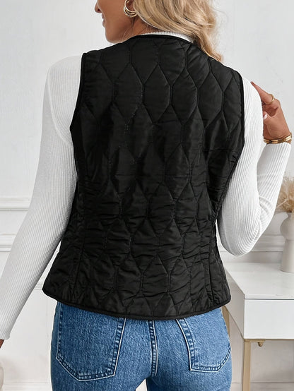 Model wearing a men's quilted bomber vest with sherpa lining, perfect for casual fall outfits.