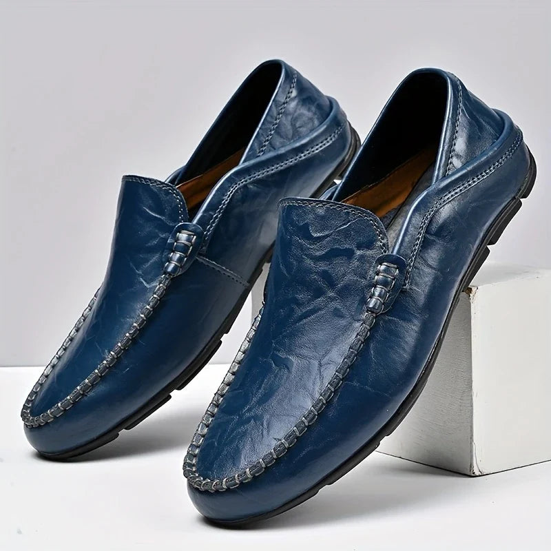Navy blue Ravello Italian slip-on loafers for men, stylish and versatile dress & casual footwear.