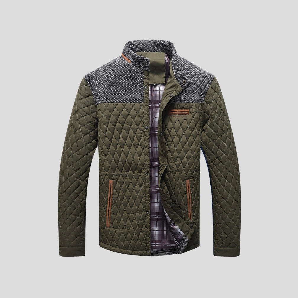 Stylish men's quilted winter jacket for modern fashion. Warm, long-sleeve outerwear for cold weather layering.