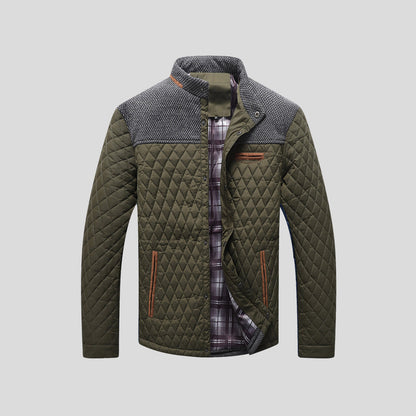 Stylish men's quilted winter jacket for modern fashion. Warm, long-sleeve outerwear for cold weather layering.