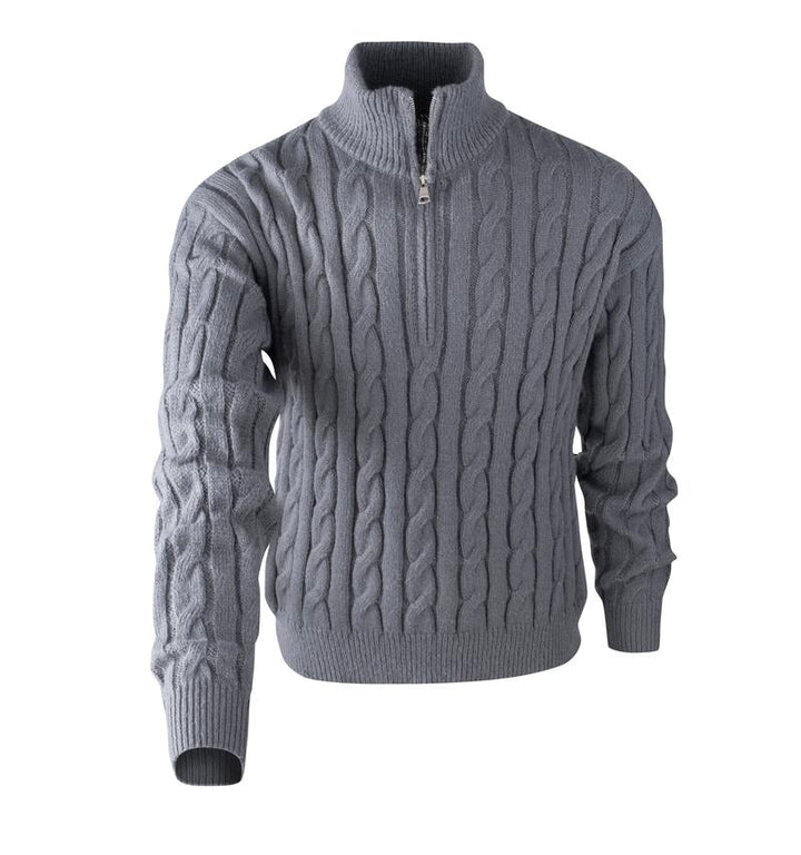 Stylish man wearing a comfortable cable knit quarter-zip sweater. Versatile classic for men's casual autumn fashion.