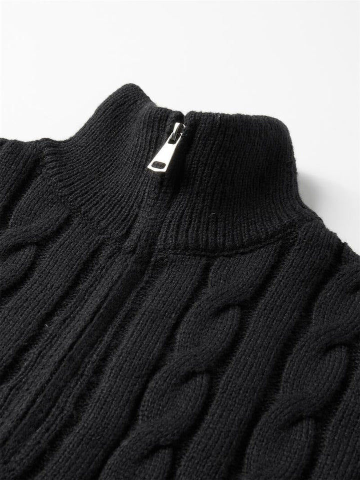 Refined men's cable knit quarter-zip sweater with textured pattern. A classic casual pullover for cooler seasons.