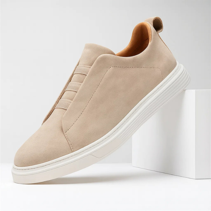 Lace-up men's fashion sneakers, offering refined style & comfort for daily wear. Brown suede texture.