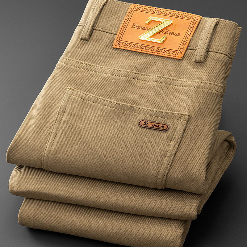 Green men's refined fit jeans. Modern tailored fit offers comfort and structured appeal.