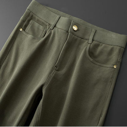 Men's structured refined fit jeans in a versatile color, offering comfort and style.