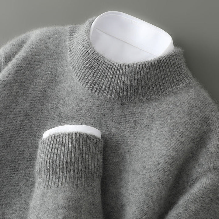Elegant men's fall/winter sweater. Refined long sleeve crewneck pullover with soft touch for versatile layering.
