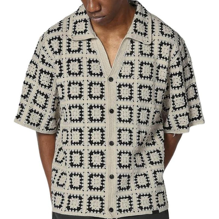 Textured men's casual button-down knit shirt, short sleeve, featuring a contemporary geometric design.