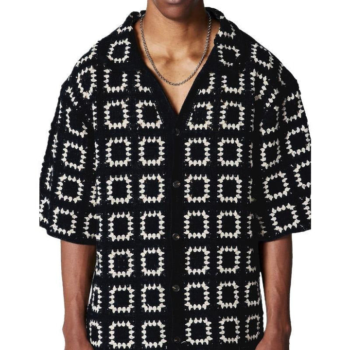 Elegant men's short sleeve knit shirt with a sophisticated geometric pattern; a stylish modern fit.