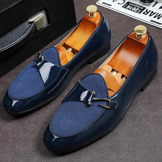 Men's Regal black leather dress loafers. Classic slip-on shoes for formal wear, office, and sophisticated style.