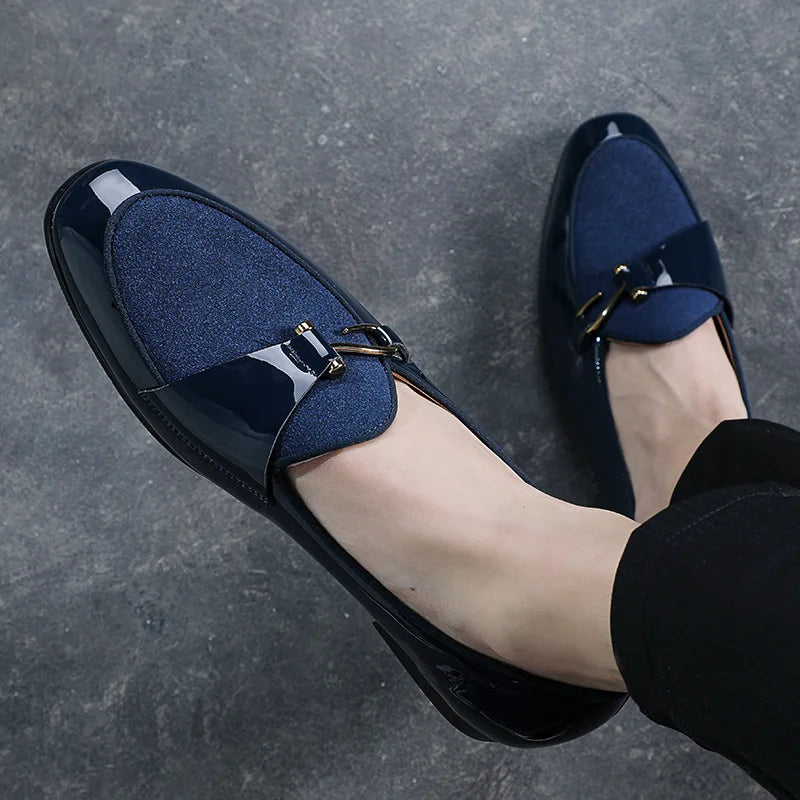 Elegant men's black leather dress loafers. Sophisticated slip-on shoes perfect for formal events, business, & fashion.