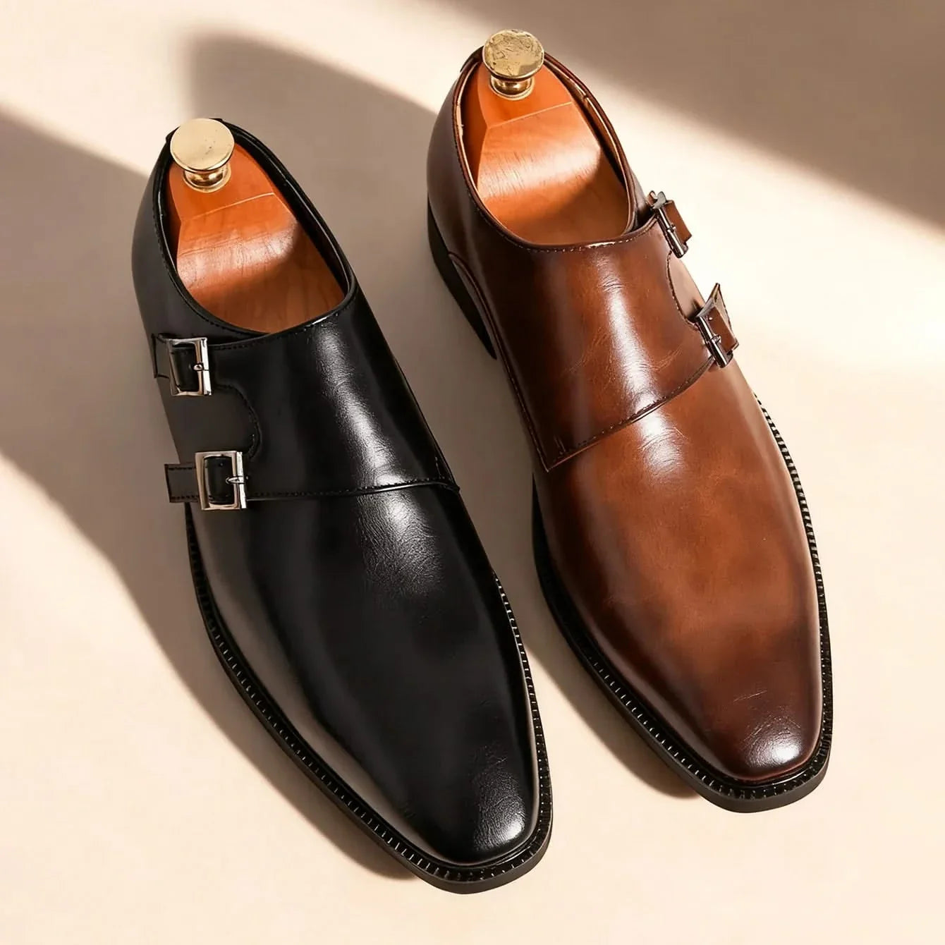 Durable men's black leather Regent Monk Loafers, built for lasting sleek style & comfort in professional fashion.