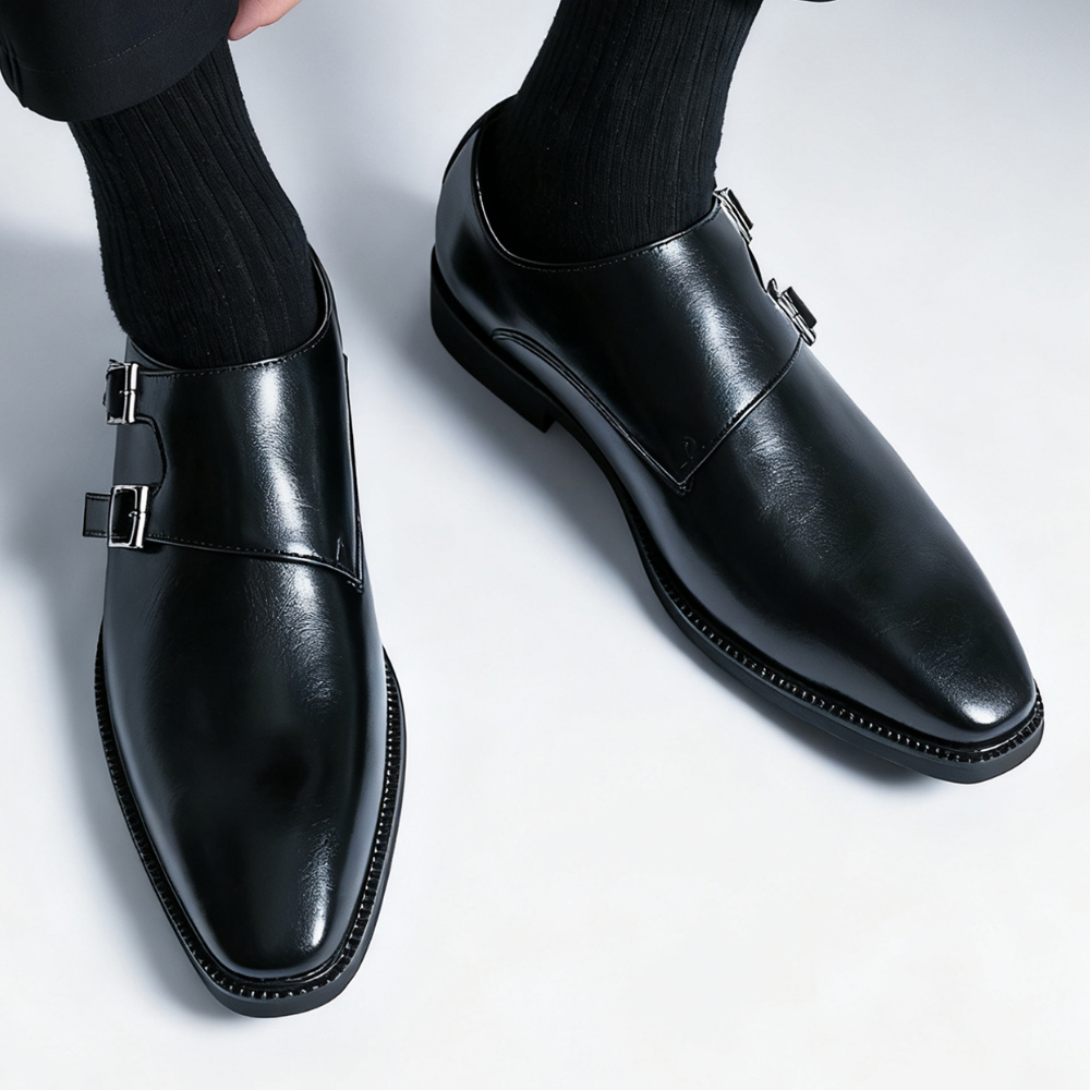 Top view of men's sophisticated Regent Monk Loafers. Premium black leather and meticulous craftsmanship.