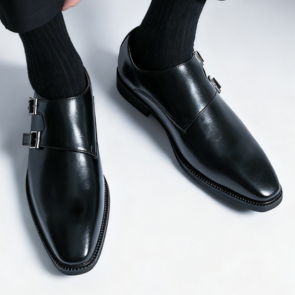 Top view of men's sophisticated Regent Monk Loafers. Premium black leather and meticulous craftsmanship.