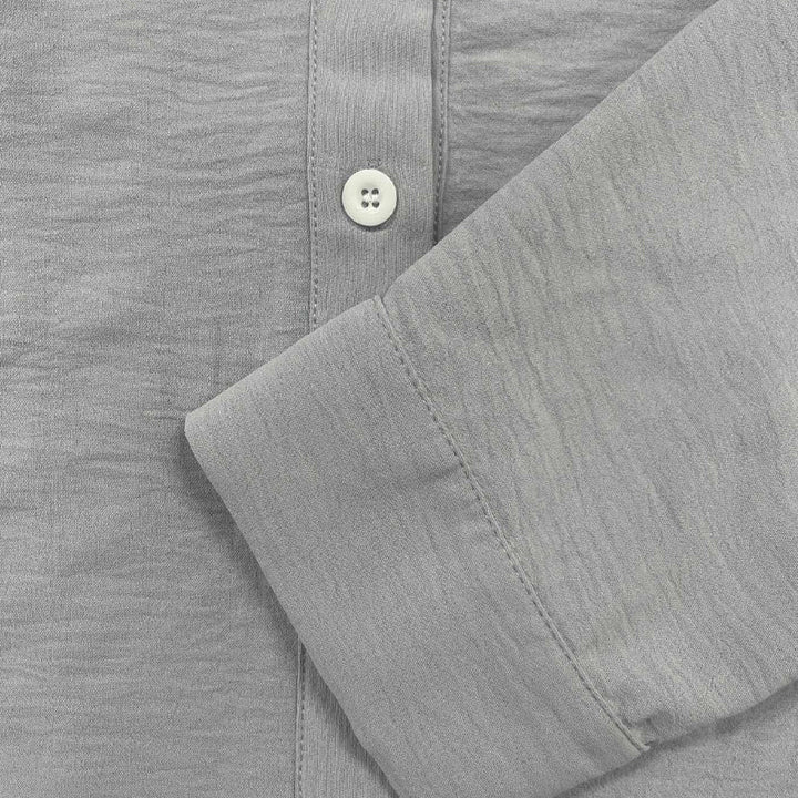 Relaxed men's short sleeve button-up shirt, a breathable regular fit casual top for summer holidays.