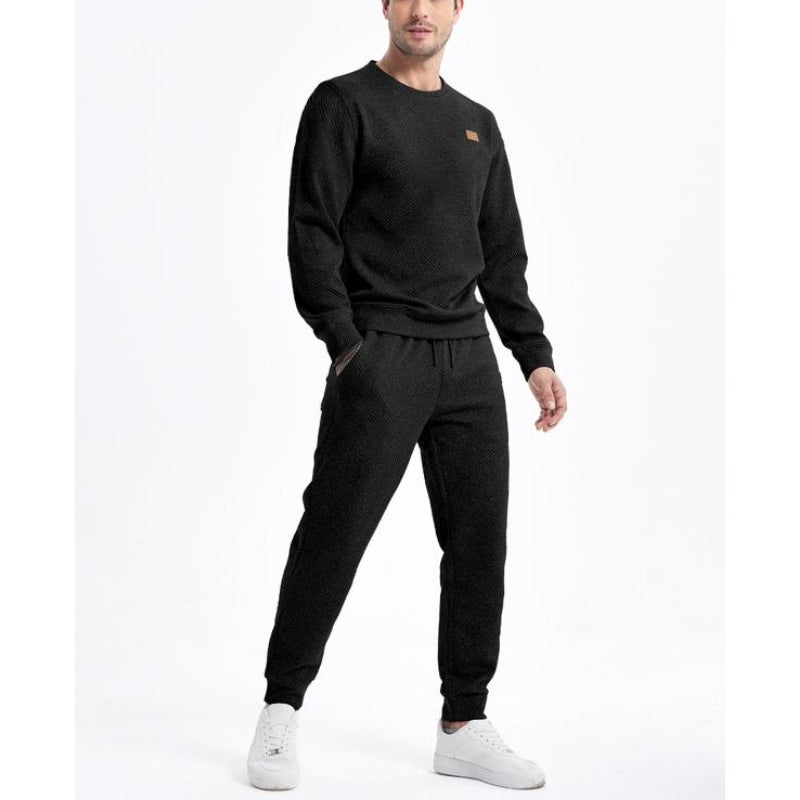 Stylish men's two-piece sweatsuit set for ultimate comfort; ideal for loungewear or athletic activities.