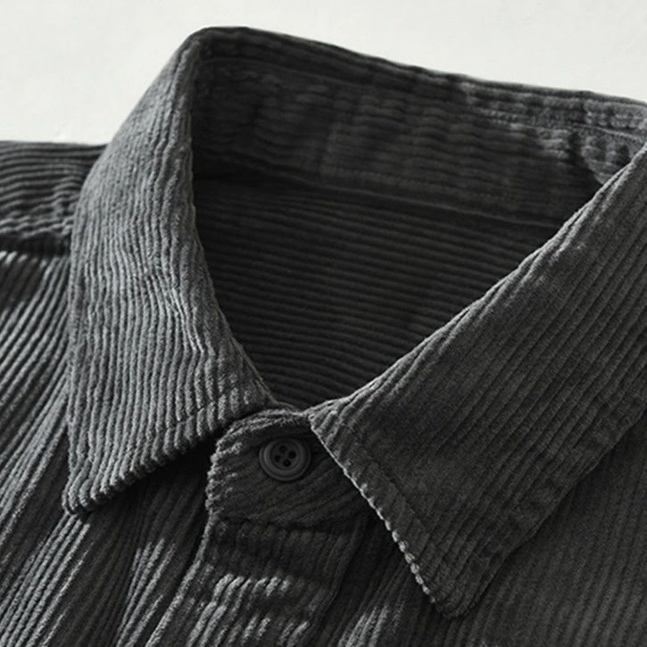 Stylish men's abstract pattern long-sleeve shirt in a relaxed fit. Versatile button-up casual menswear.